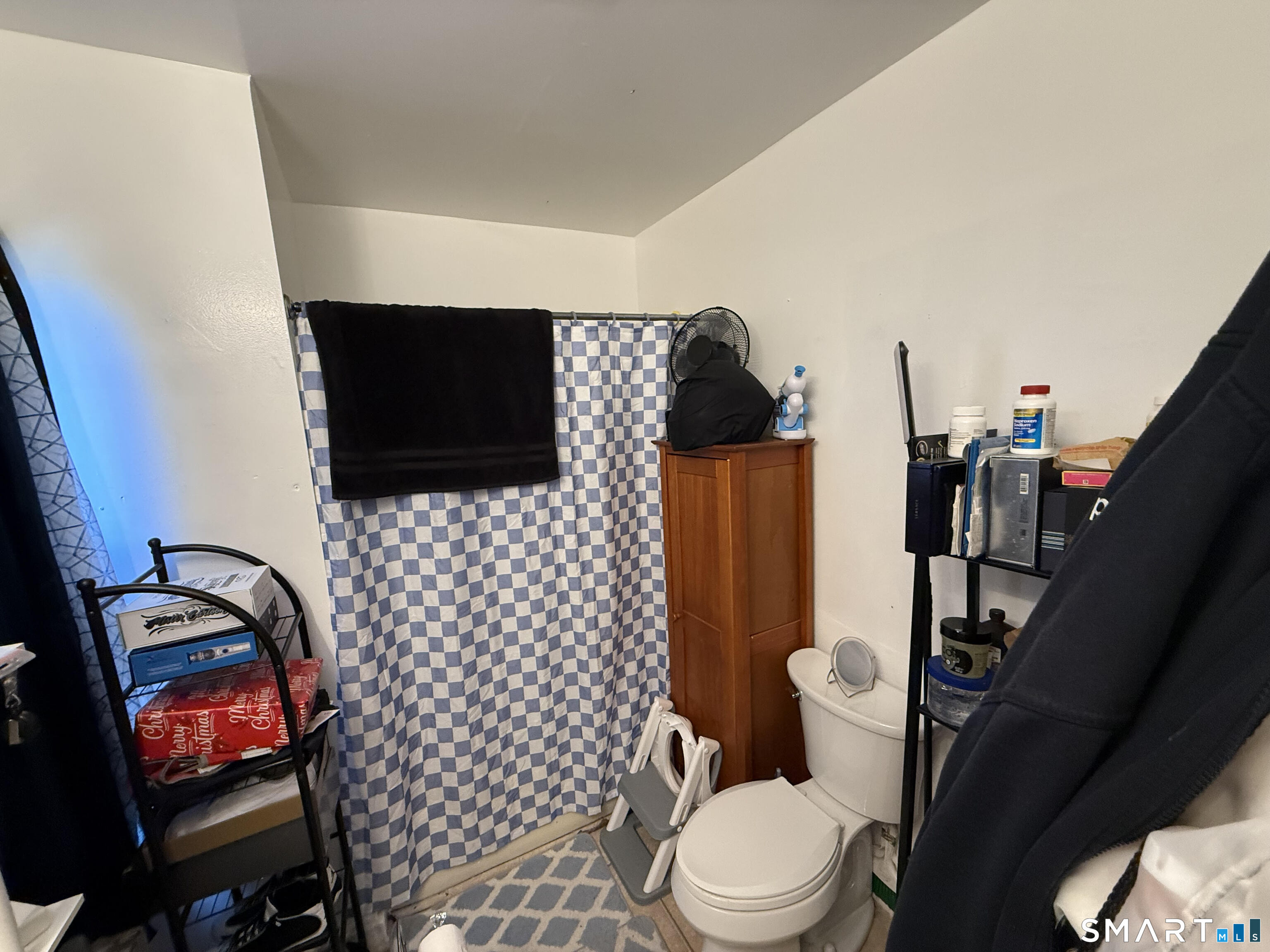 128 Hobart Street Meriden, CT 06450 - Photo 9 of 15 a bathroom with a toilet and a shower