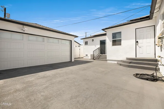 a view of a house with garage