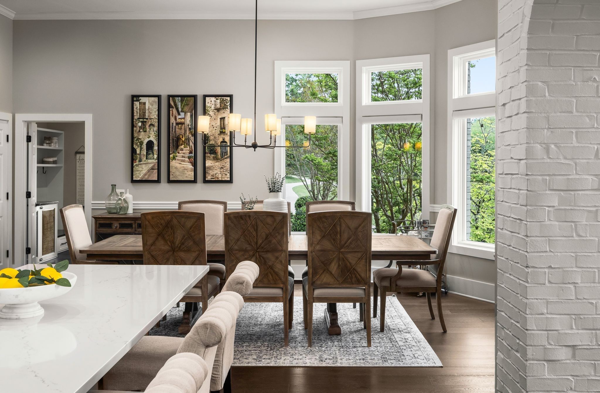 1026 Holly Tree Gap Road Brentwood, TN 37027 - Photo 16 of 71 a view of a dining room with furniture large windows and wooden floor