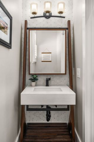 a view of a deck in the backyard