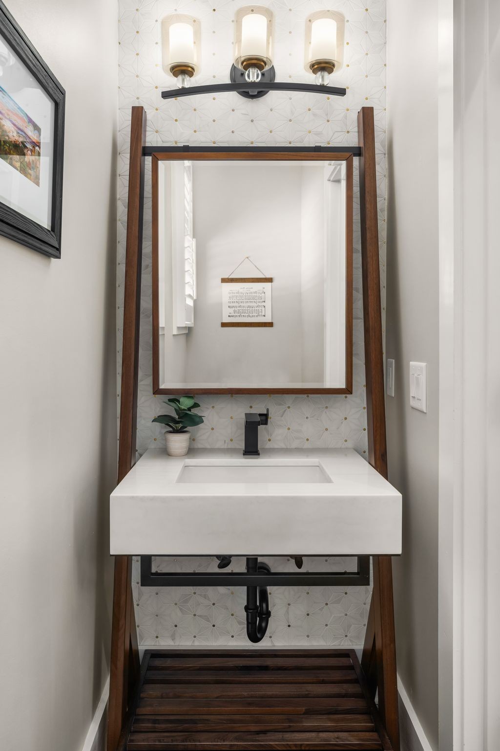 1026 Holly Tree Gap Road Brentwood, TN 37027 - Photo 22 of 71 a bathroom with a sink and a mirror