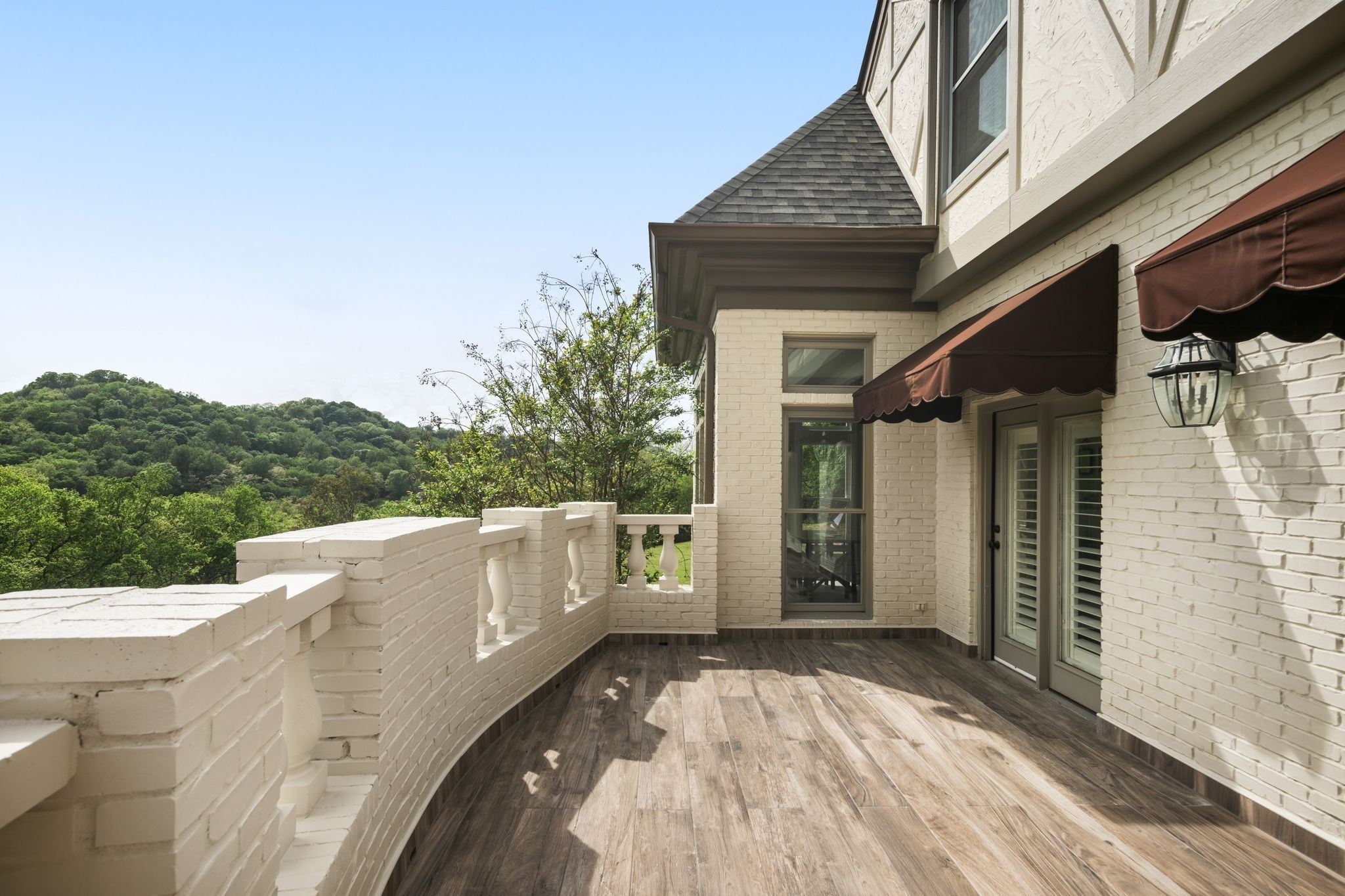 1026 Holly Tree Gap Road Brentwood, TN 37027 - Photo 32 of 71 a view of a house with a garage