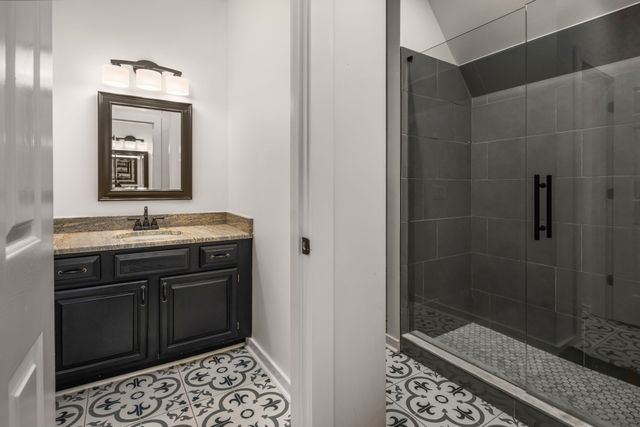 a front view of house with garden