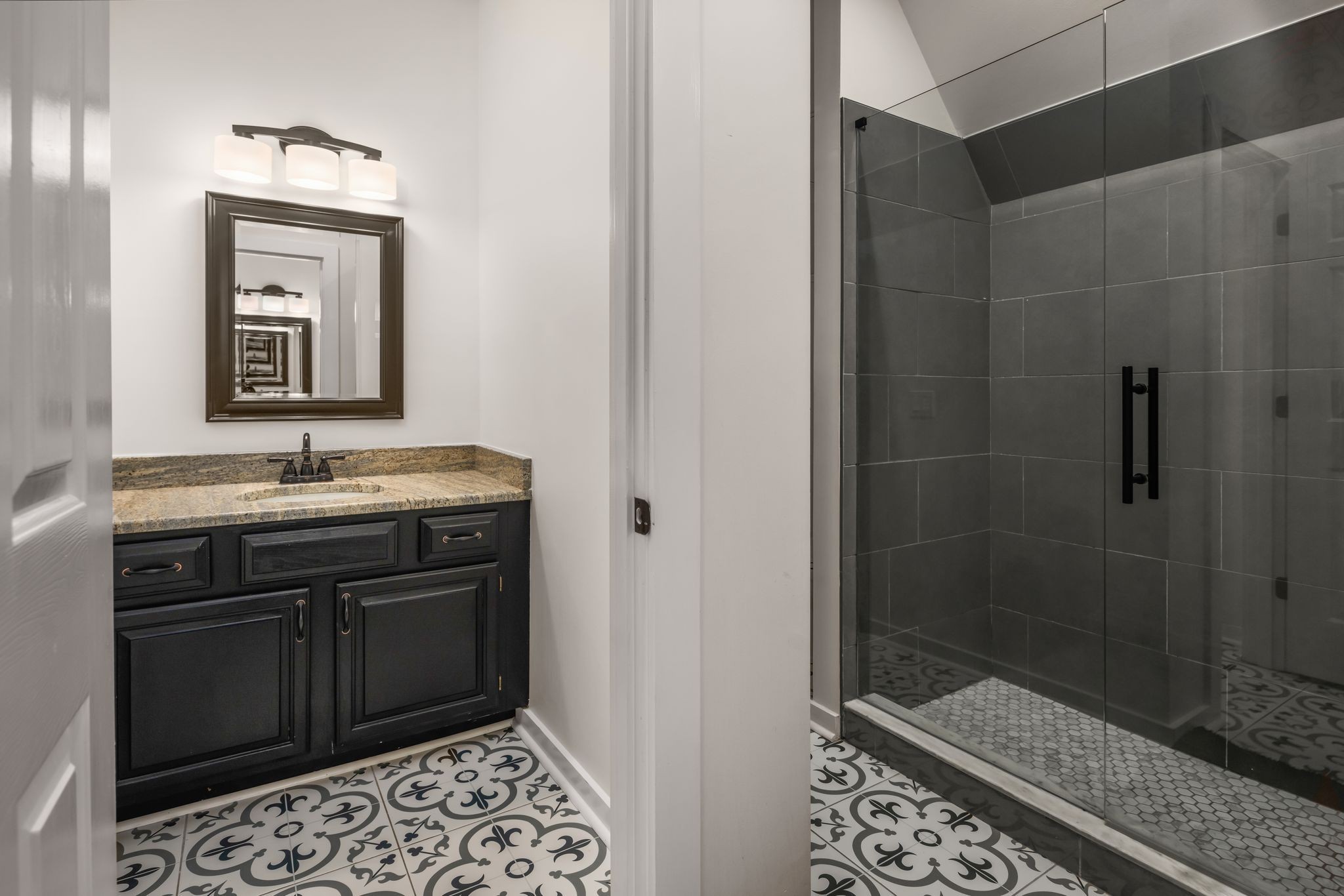 1026 Holly Tree Gap Road Brentwood, TN 37027 - Photo 35 of 71 a bathroom with a sink and a mirror