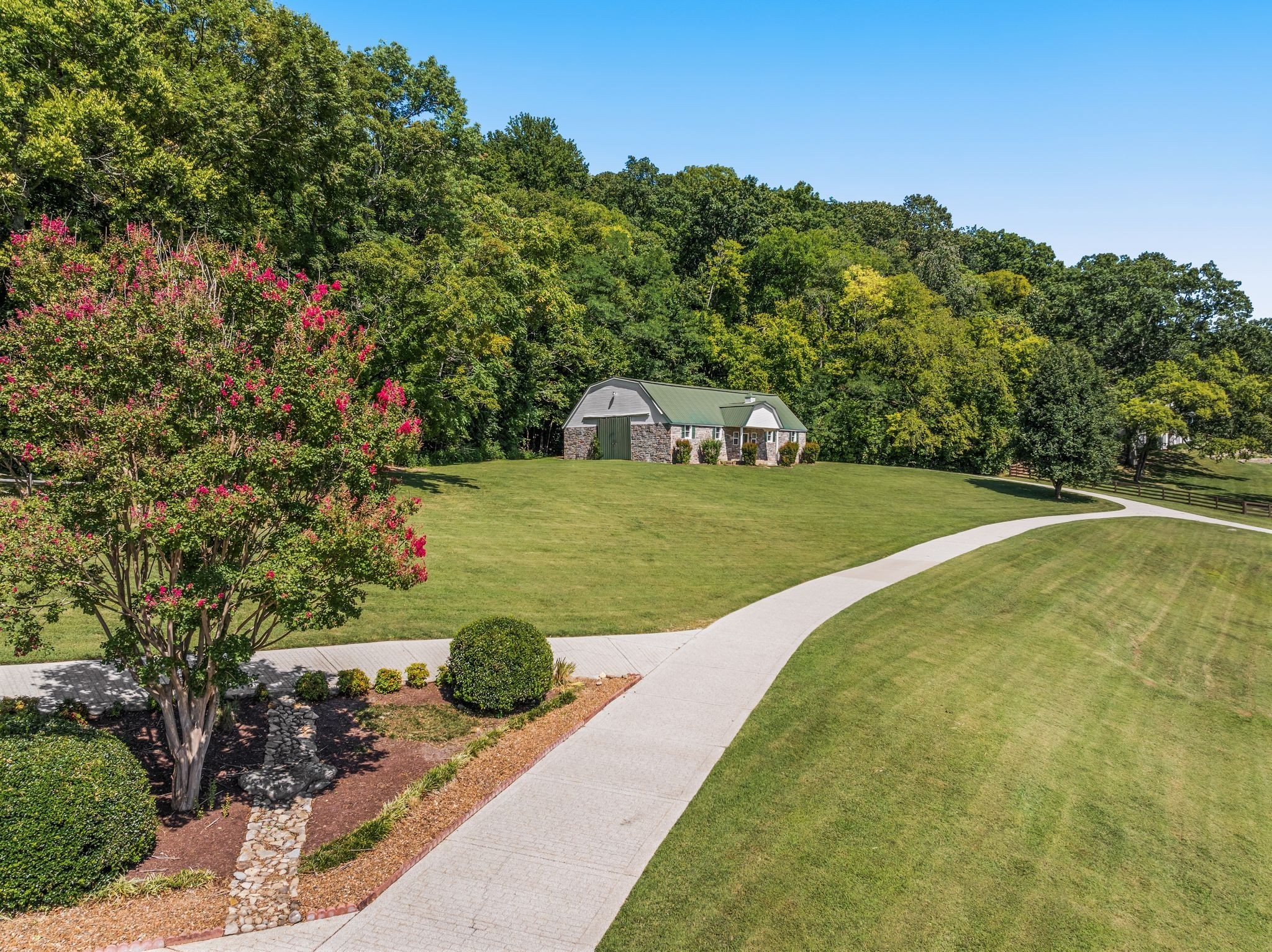 1026 Holly Tree Gap Road Brentwood, TN 37027 - Photo 63 of 71 a view of a park with large trees