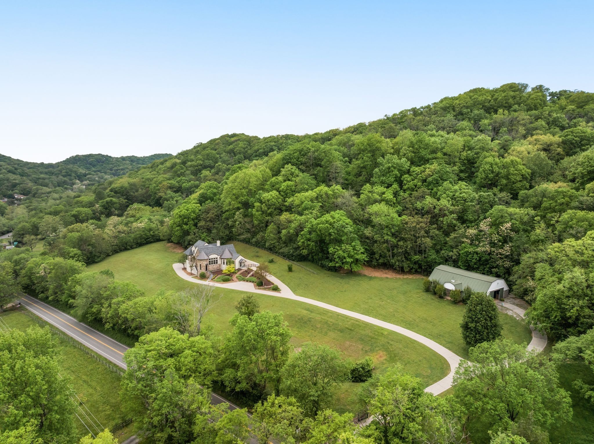 1026 Holly Tree Gap Road Brentwood, TN 37027 - Photo 65 of 71 a view of a backyard with a garden and mountain view