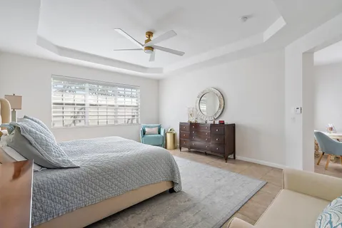 a view of living room with furniture and a window
