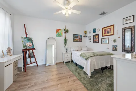 a bedroom with a bed and furniture