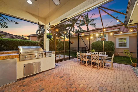 a view of a house with a yard and plants