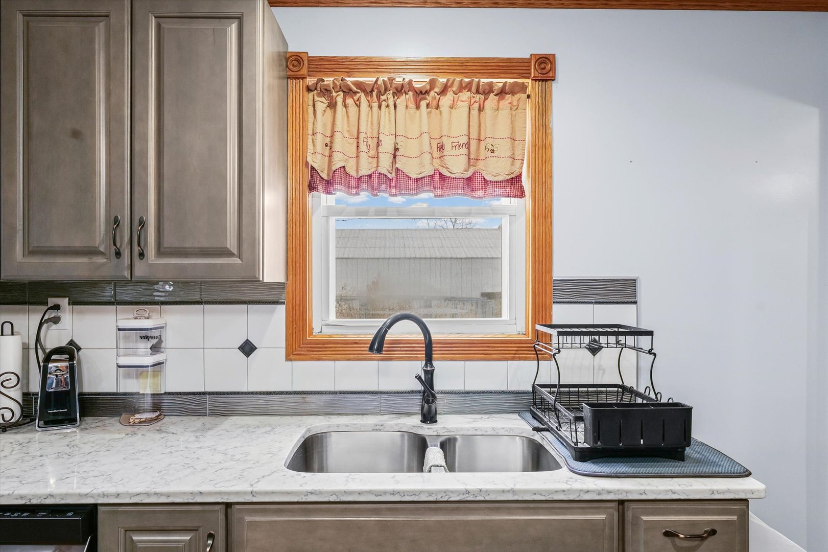 1636 East 1500 North Road Roberts, IL 60962 - Photo 12 of 49 a kitchen with a sink and a window
