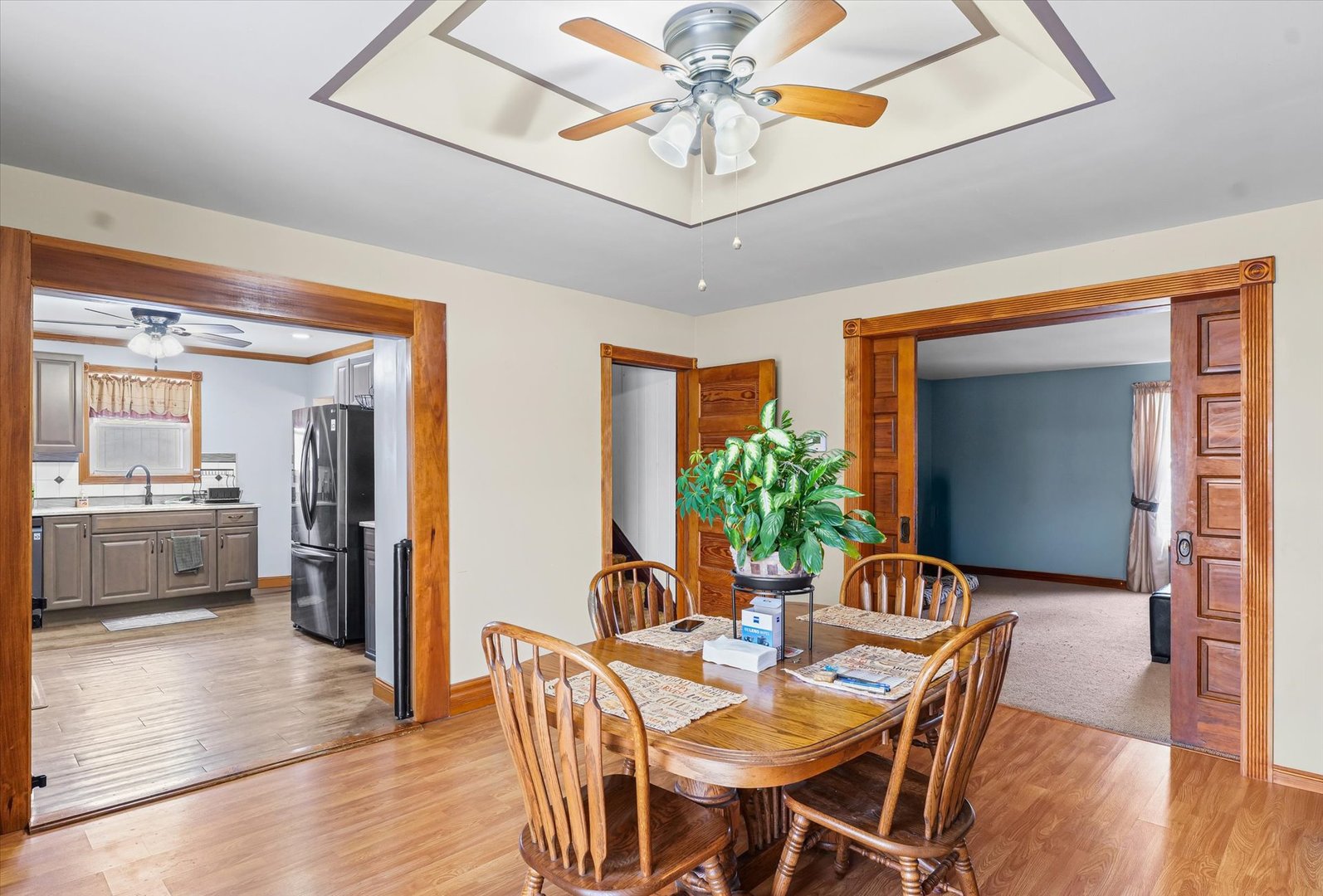 1636 East 1500 North Road Roberts, IL 60962 - Photo 14 of 49 a view of a dining room with furniture and wooden floor