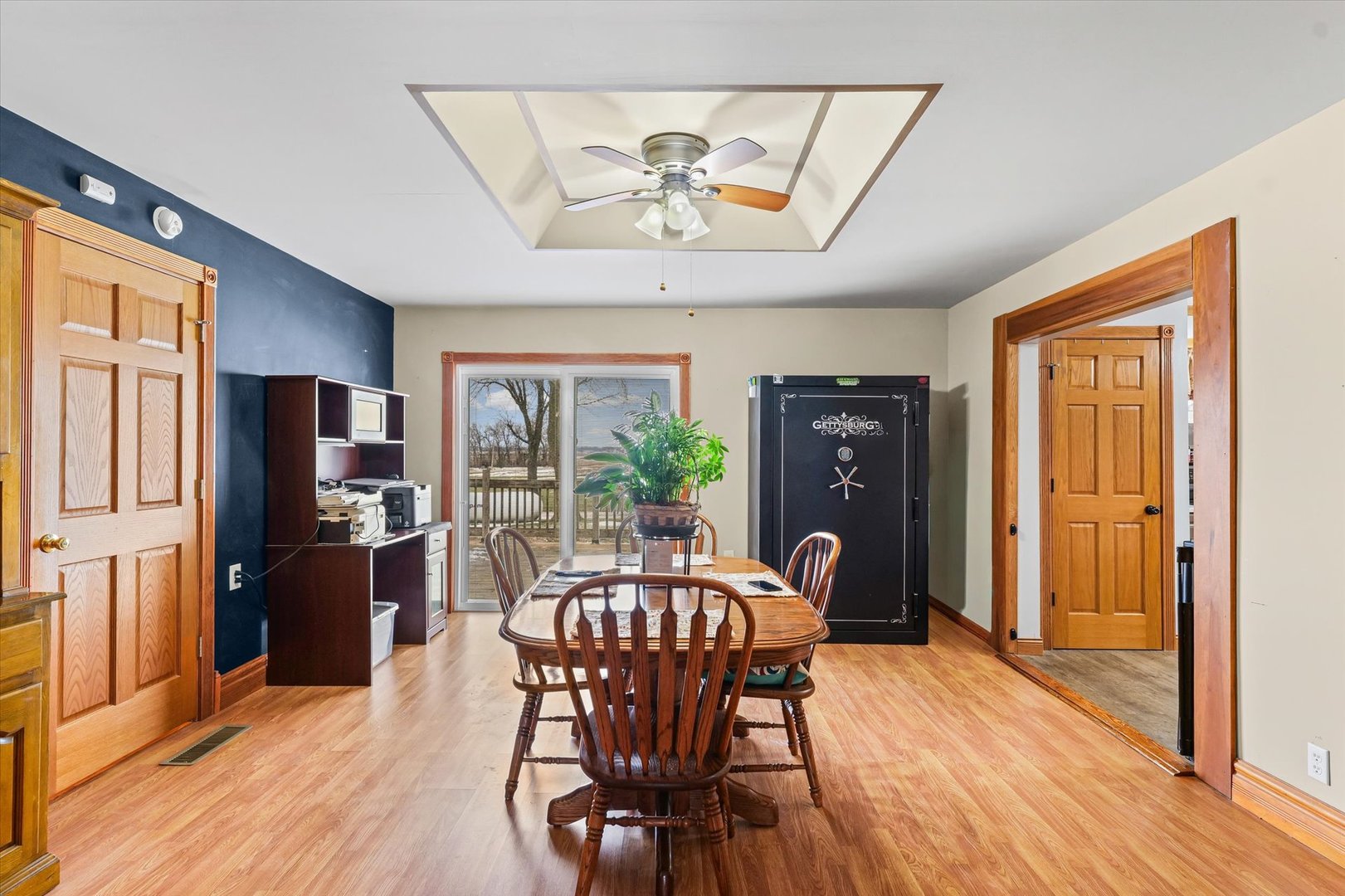 1636 East 1500 North Road Roberts, IL 60962 - Photo 15 of 49 a view of a dining room with furniture window and wooden floor