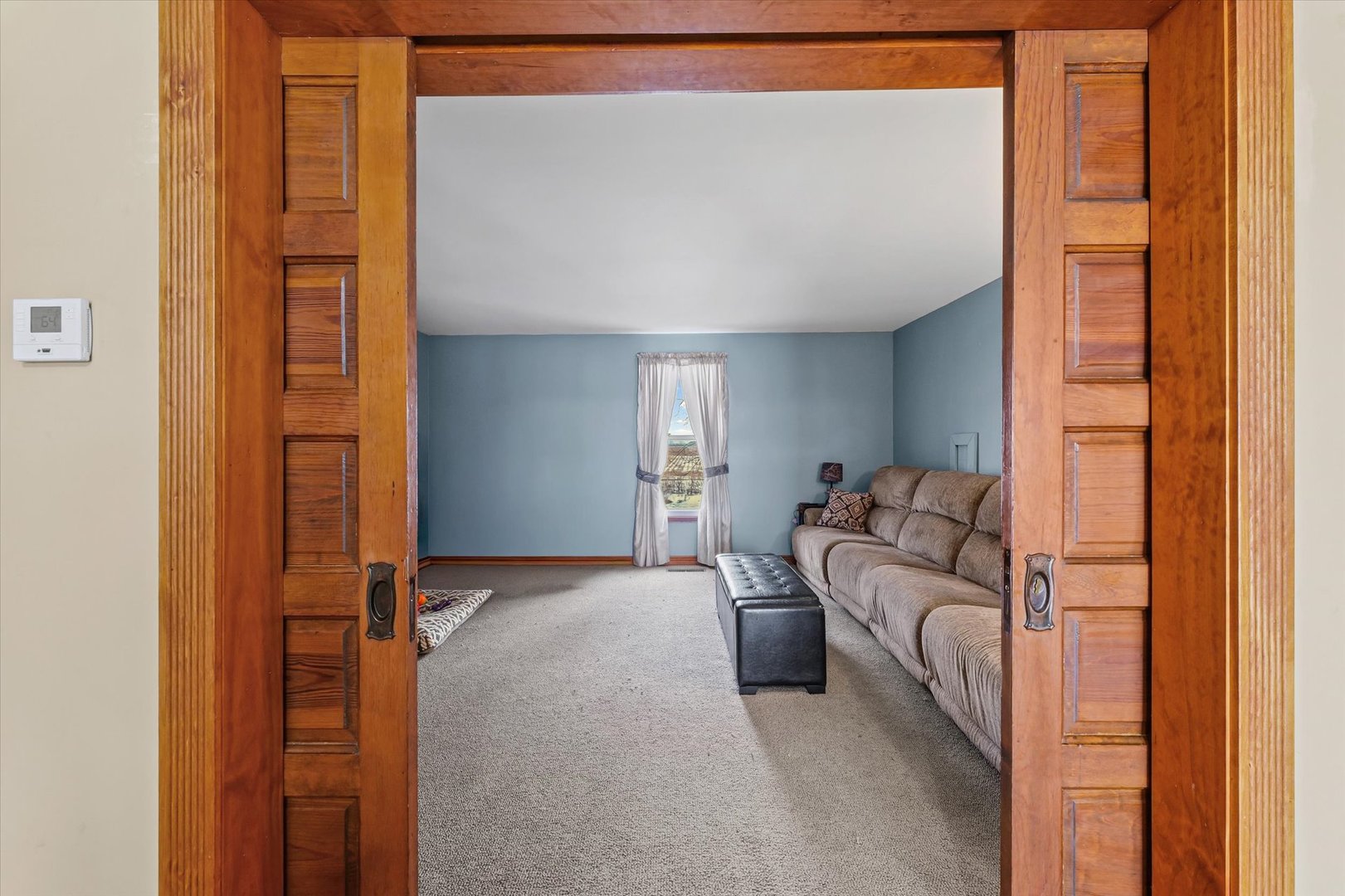1636 East 1500 North Road Roberts, IL 60962 - Photo 16 of 49 a living room with furniture and a window