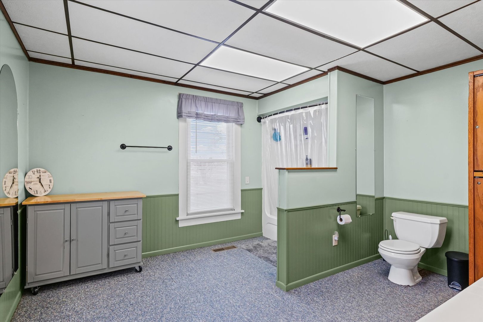 1636 East 1500 North Road Roberts, IL 60962 - Photo 27 of 49 a bathroom with a toilet sink and mirror