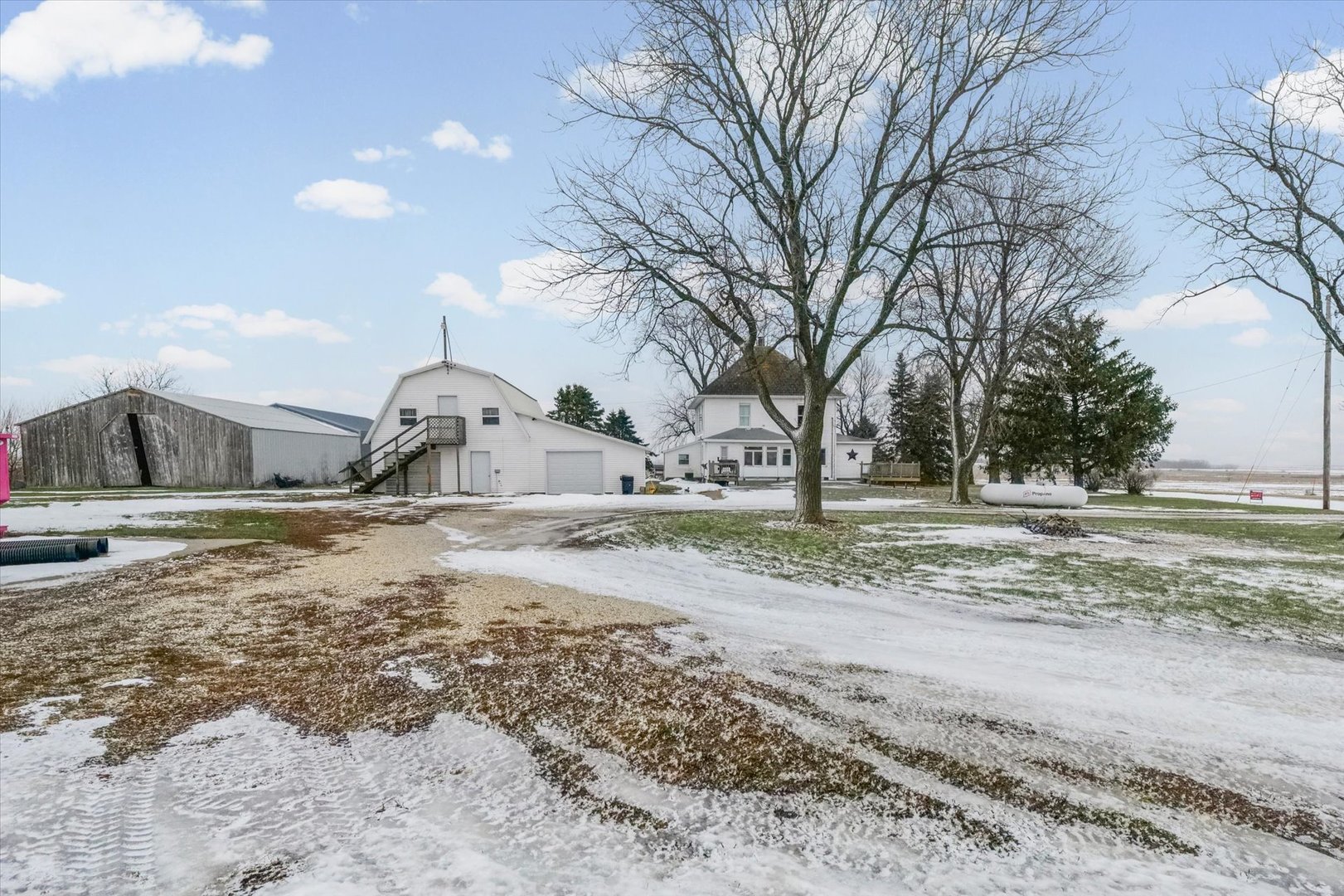 1636 East 1500 North Road Roberts, IL 60962 - Photo 40 of 49 a house view with a outdoor space