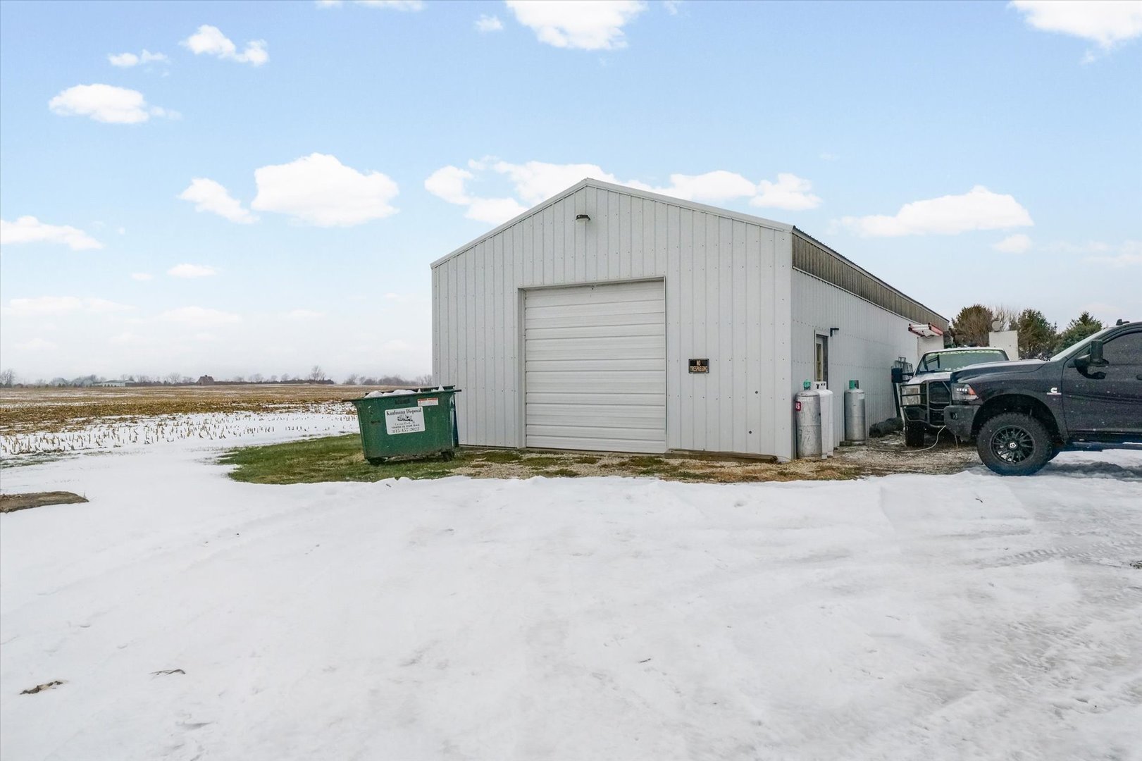 1636 East 1500 North Road Roberts, IL 60962 - Photo 48 of 49 a front view of a house with yard and ocean view