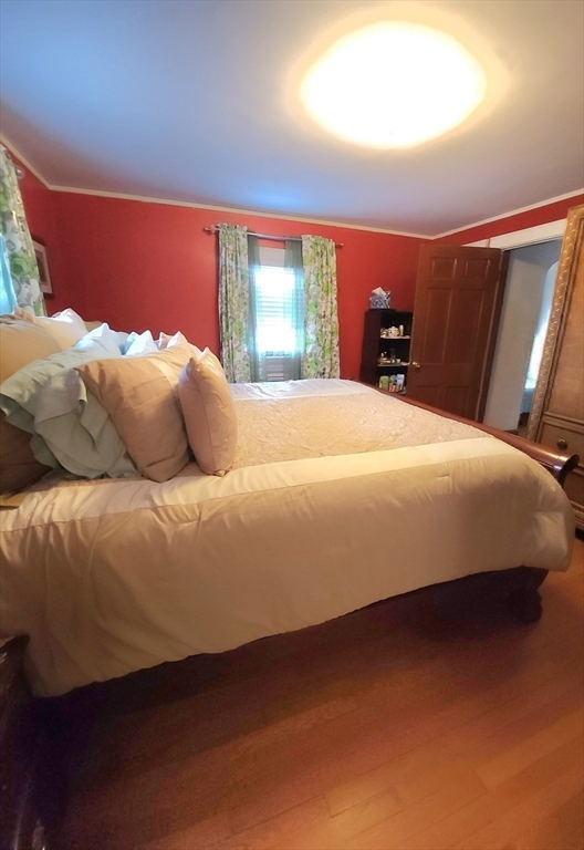 96 Brook Road Milton, MA 02186 - Photo 22 of 34 a bedroom with a bed and window