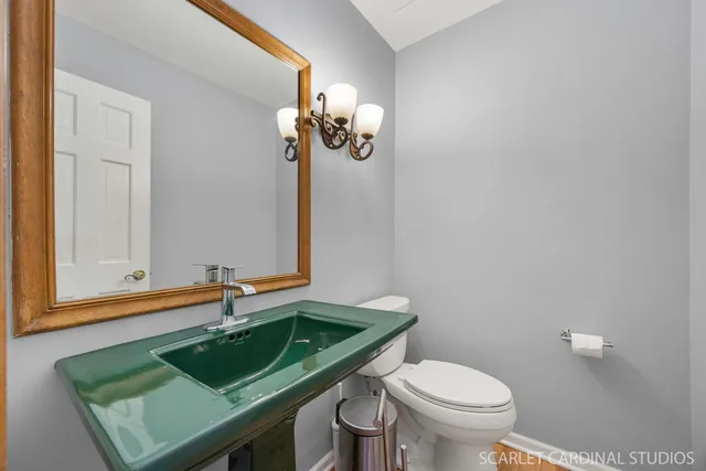 a bathroom with a sink and a toilet
