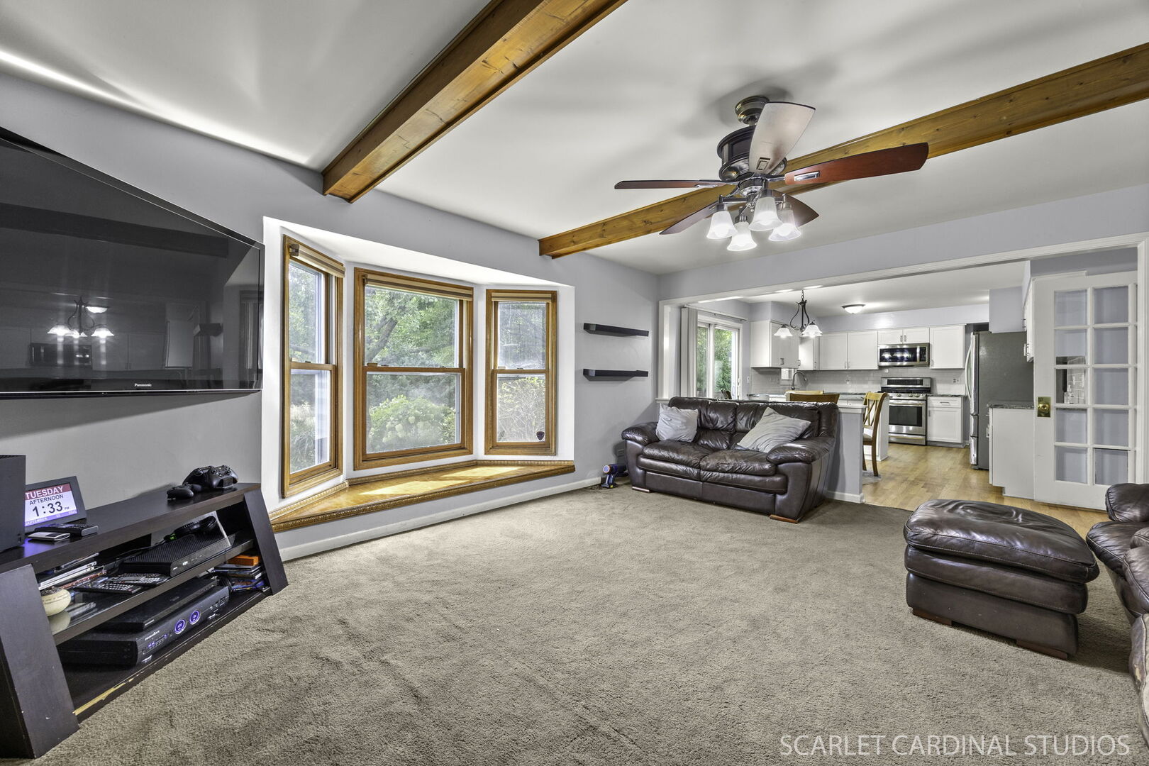 912 Sanctuary Lane Naperville, IL 60540 - Photo 13 of 31 a living room with furniture and a flat screen tv