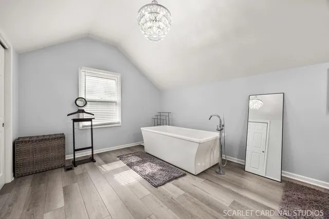 a view of livingroom with furniture and windows
