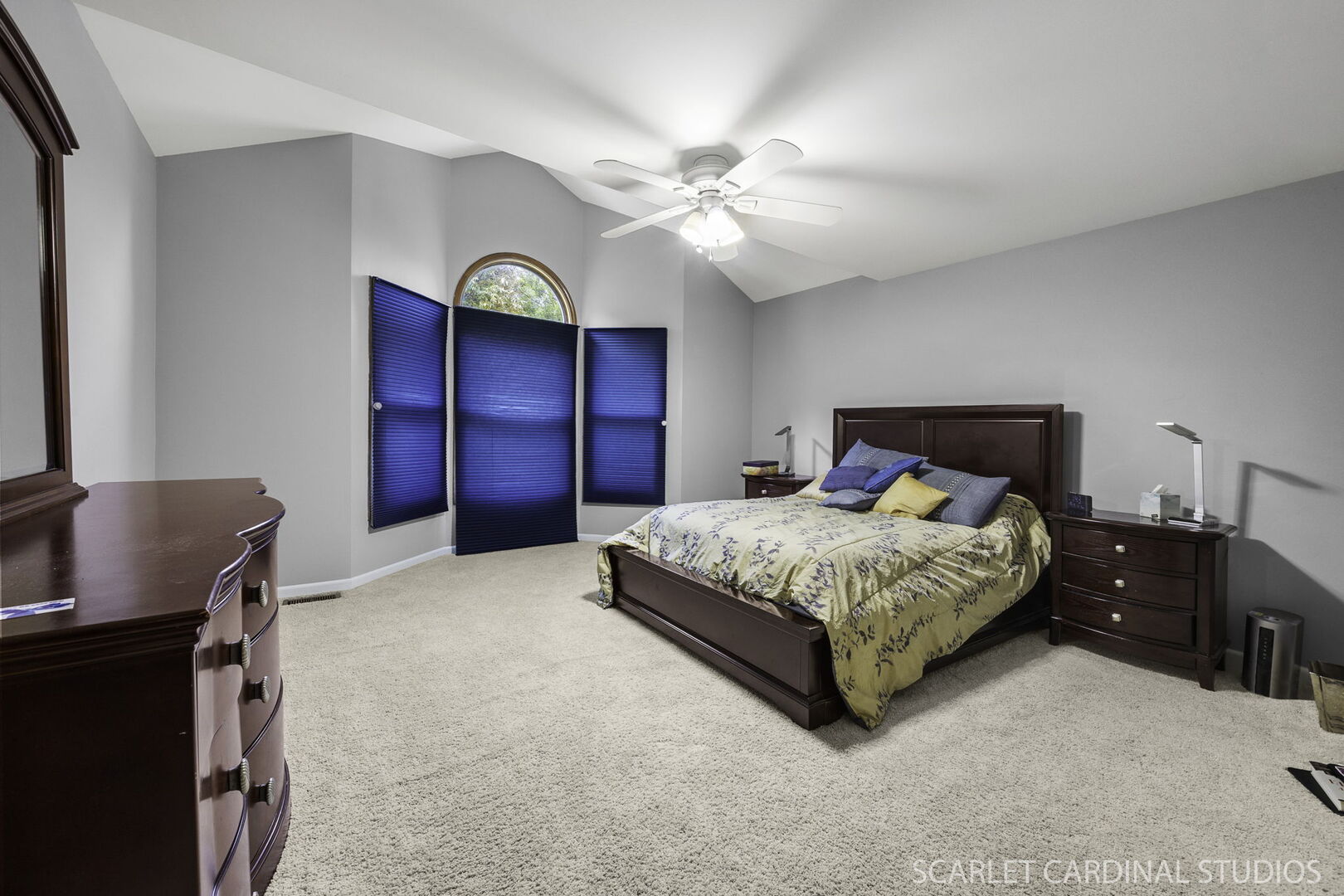 912 Sanctuary Lane Naperville, IL 60540 - Photo 19 of 31 a bedroom with a bed and a chandelier