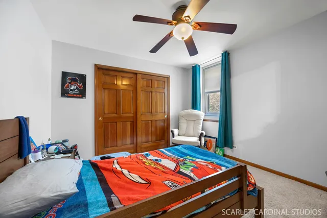 a room with pool table and a chandelier
