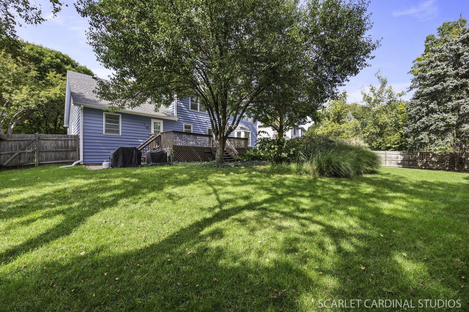 912 Sanctuary Lane Naperville, IL 60540 - Photo 28 of 31 a view of a house with a yard
