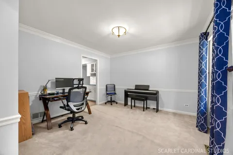 a view of a workspace with furniture