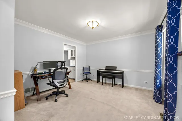 a view of a workspace with furniture