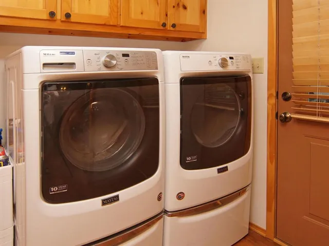 a utility room with dryer and washer