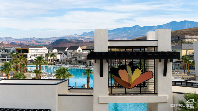 961 West Akoya Pearl Road, Unit 201 St. George, UT 84790 - Photo 40 of 67 View of swimming pool featuring a mountain view and a residential view