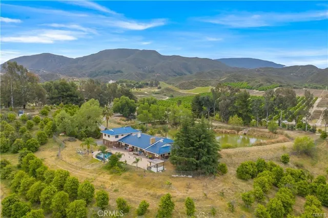 a view of a town with mountains in the background