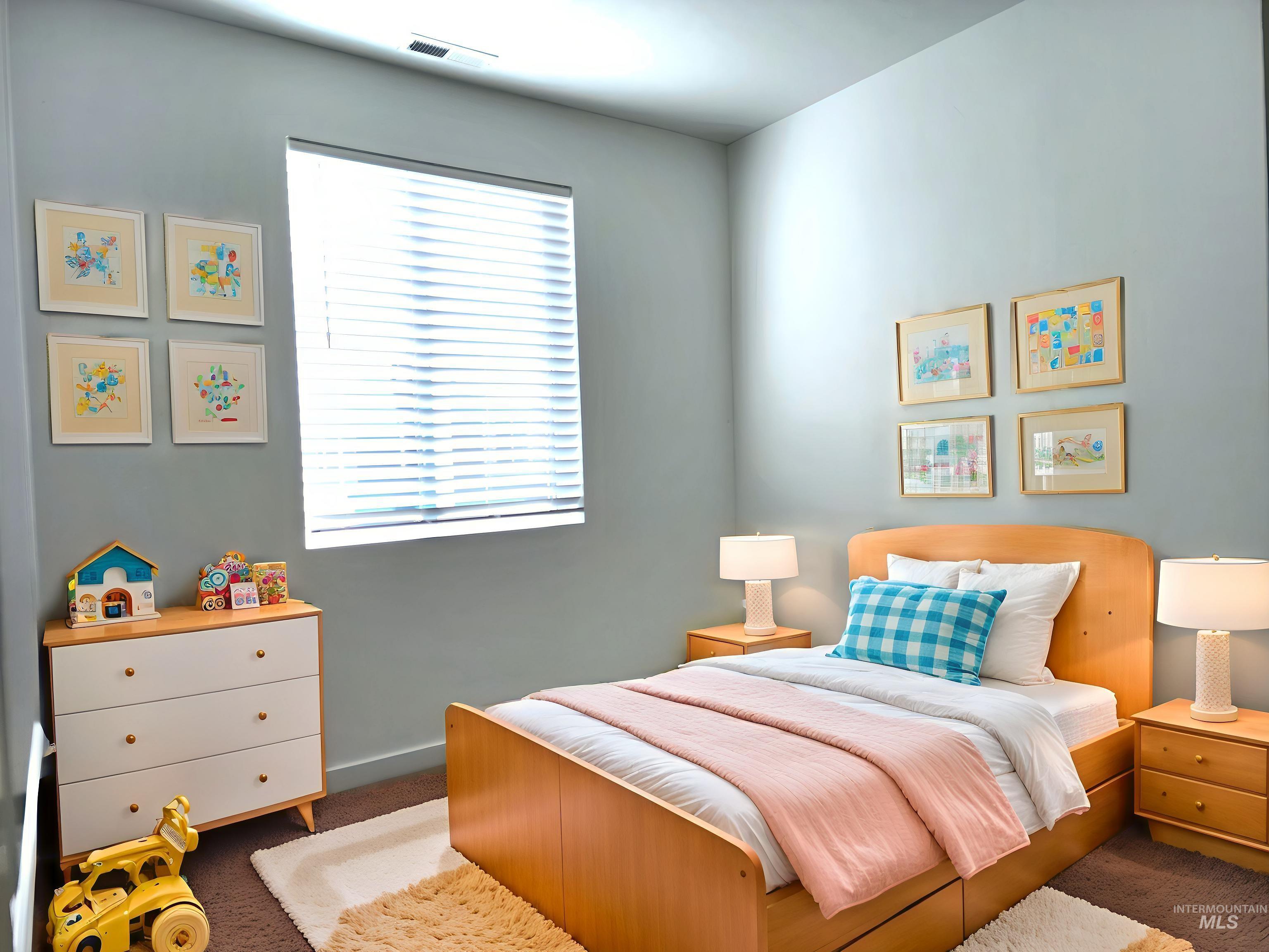 12267 West Endsley Street Star, ID 83669 - Photo 11 of 18 Carpeted bedroom with multiple windows