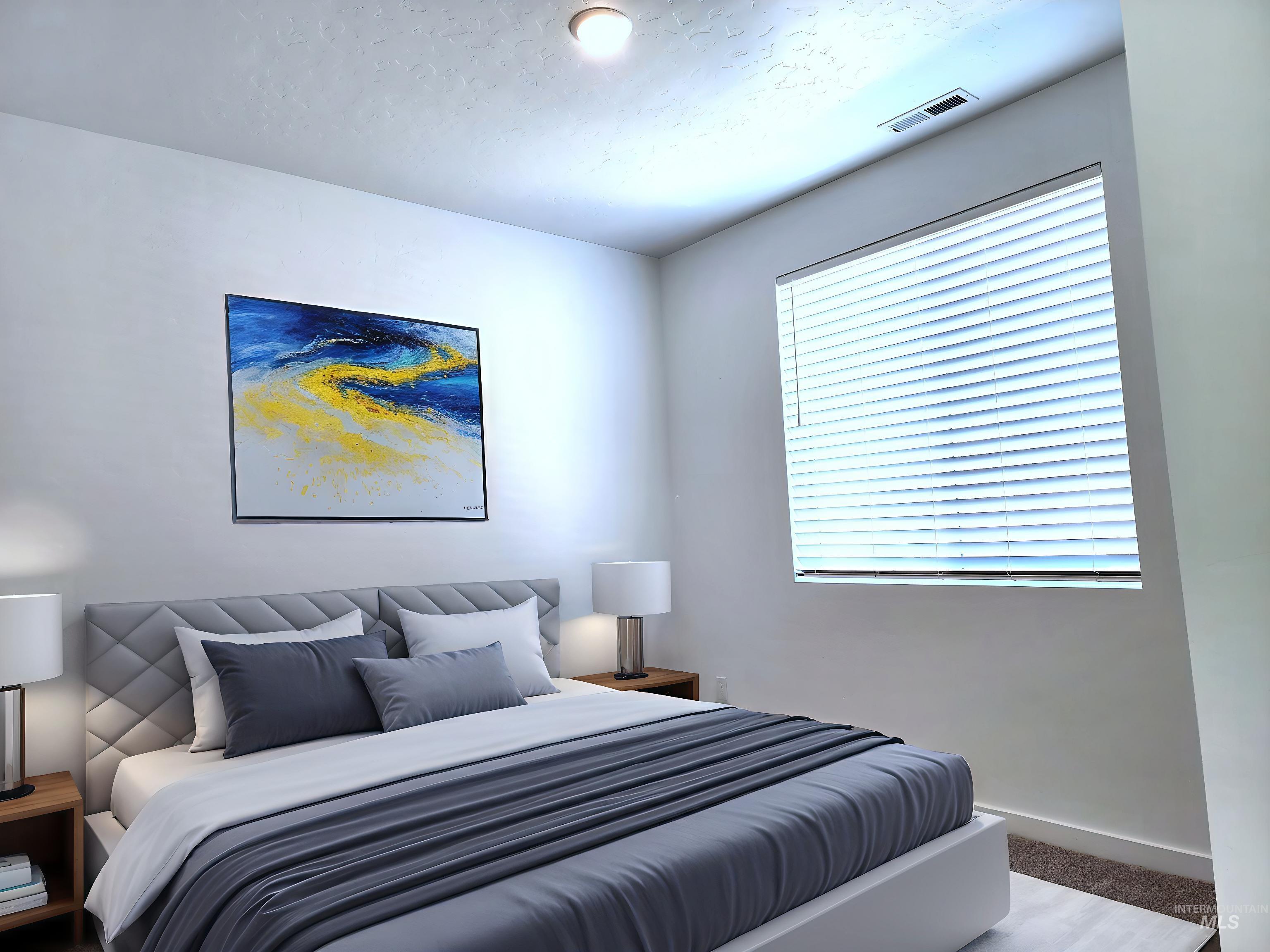 12267 West Endsley Street Star, ID 83669 - Photo 7 of 18 Bedroom with a textured ceiling and carpet floors