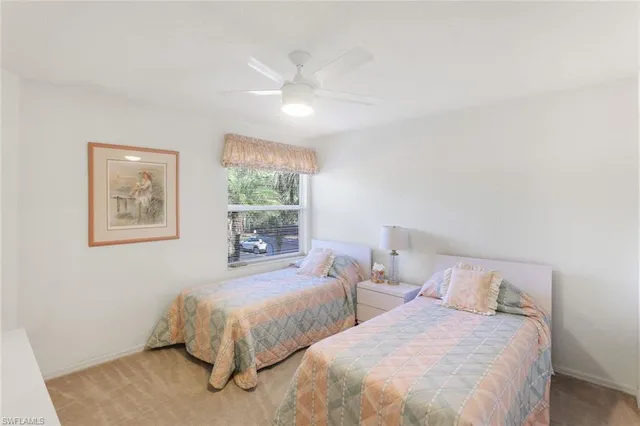 a en suite bathroom with a double vanity sink a mirror and a shower