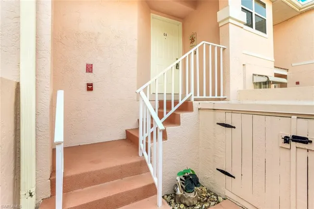 a view of entryway with a front door