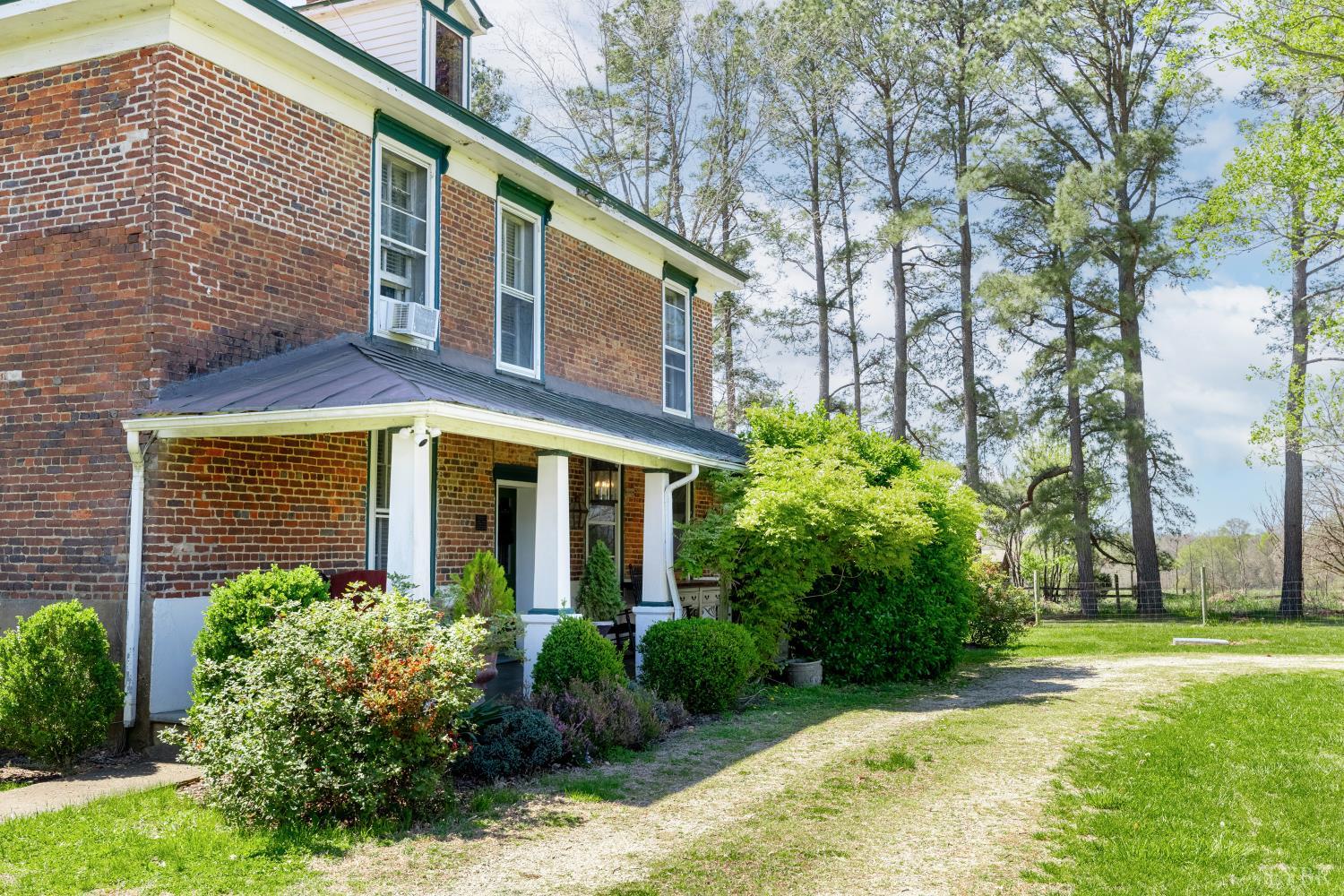 2416 Lowesville Road Amherst, VA 24521 - Photo 57 of 82 a front view of a house with garden