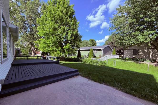 1816 Sadler Drive Champaign, IL 61821 - Photo 14 of 180 a view of house with yard entertaining space and palm trees