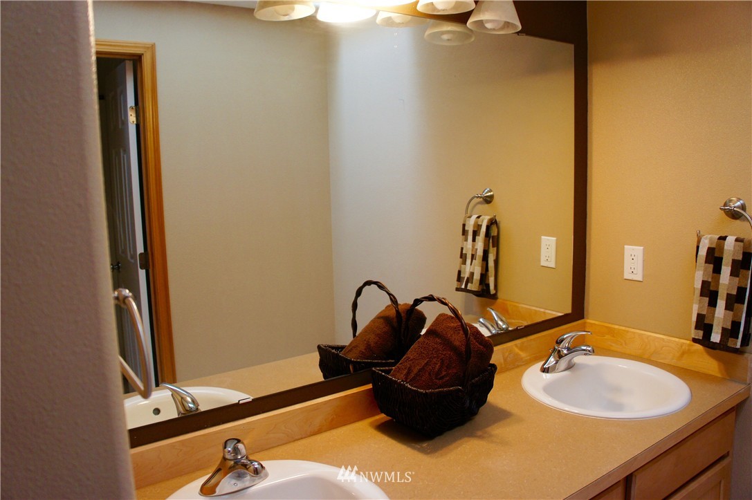356 Yates Road Chehalis, WA 98532 - Photo 16 of 21 a bathroom with a sink and a mirror
