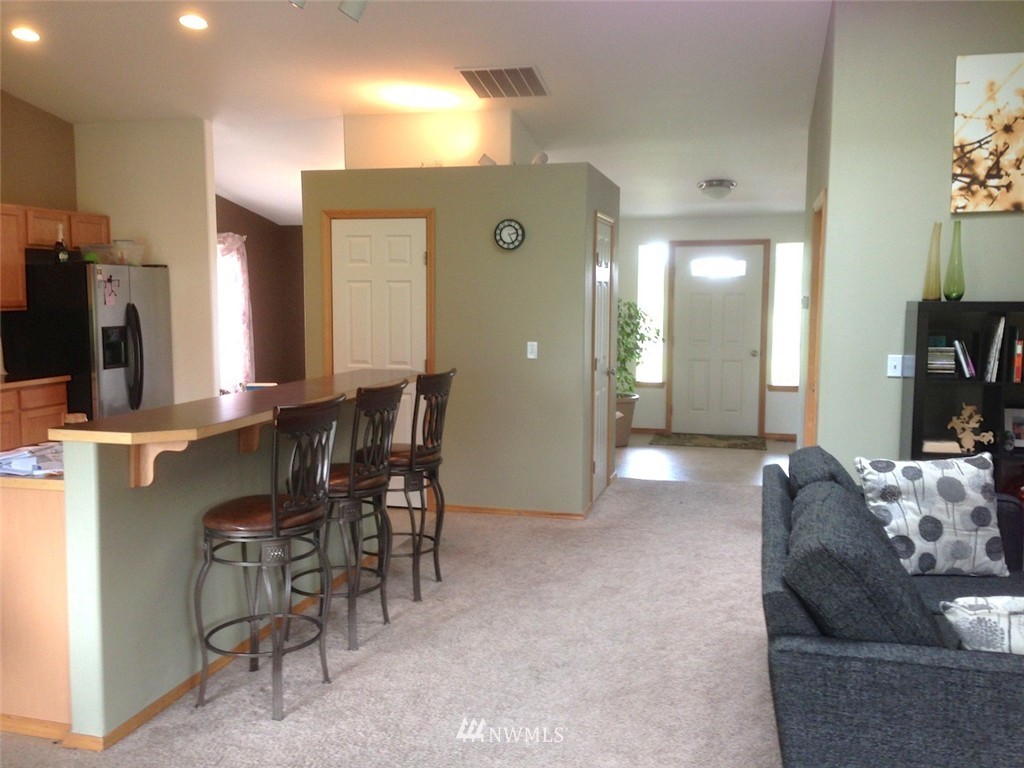 356 Yates Road Chehalis, WA 98532 - Photo 4 of 21 a living room with furniture and a flat screen tv