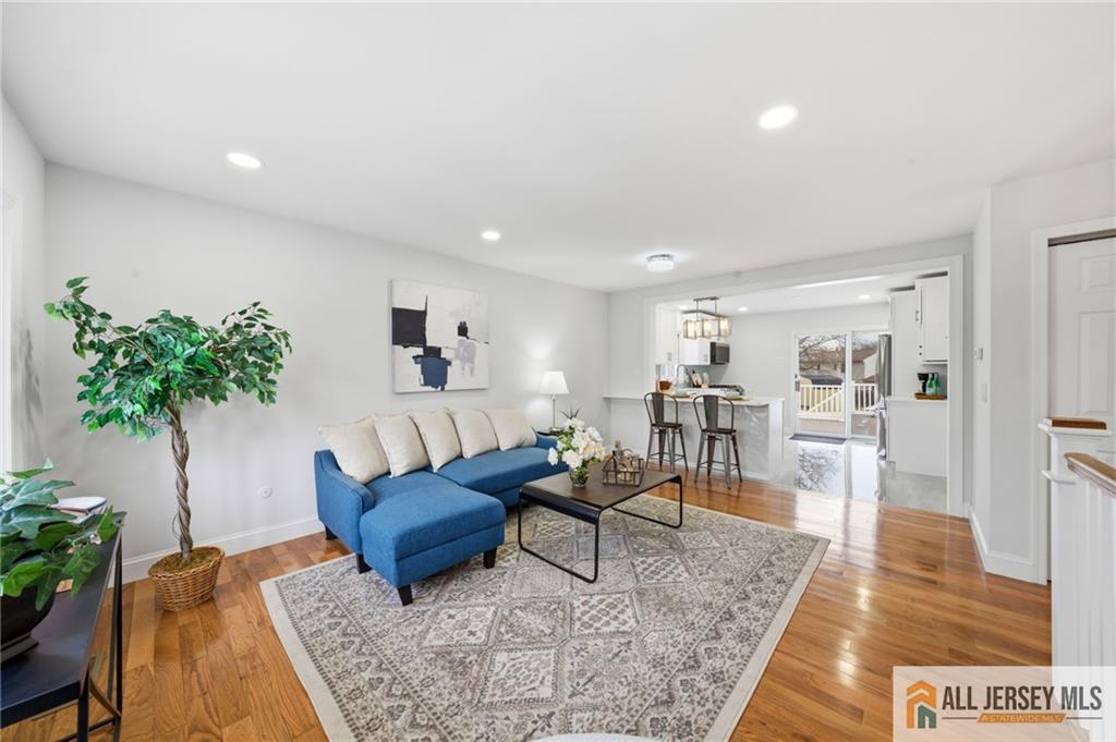 6 Wilton Avenue Middlesex, NJ 08846 - Photo 12 of 50 a living room with furniture and a wooden floor