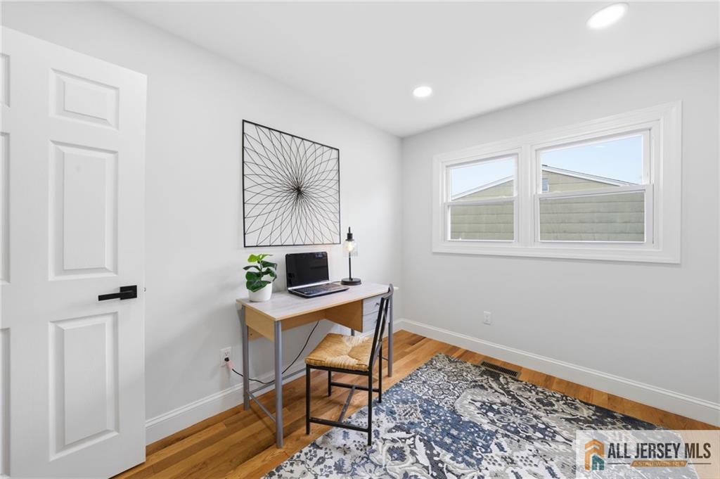 6 Wilton Avenue Middlesex, NJ 08846 - Photo 25 of 50 a workspace room with wooden floor and windows