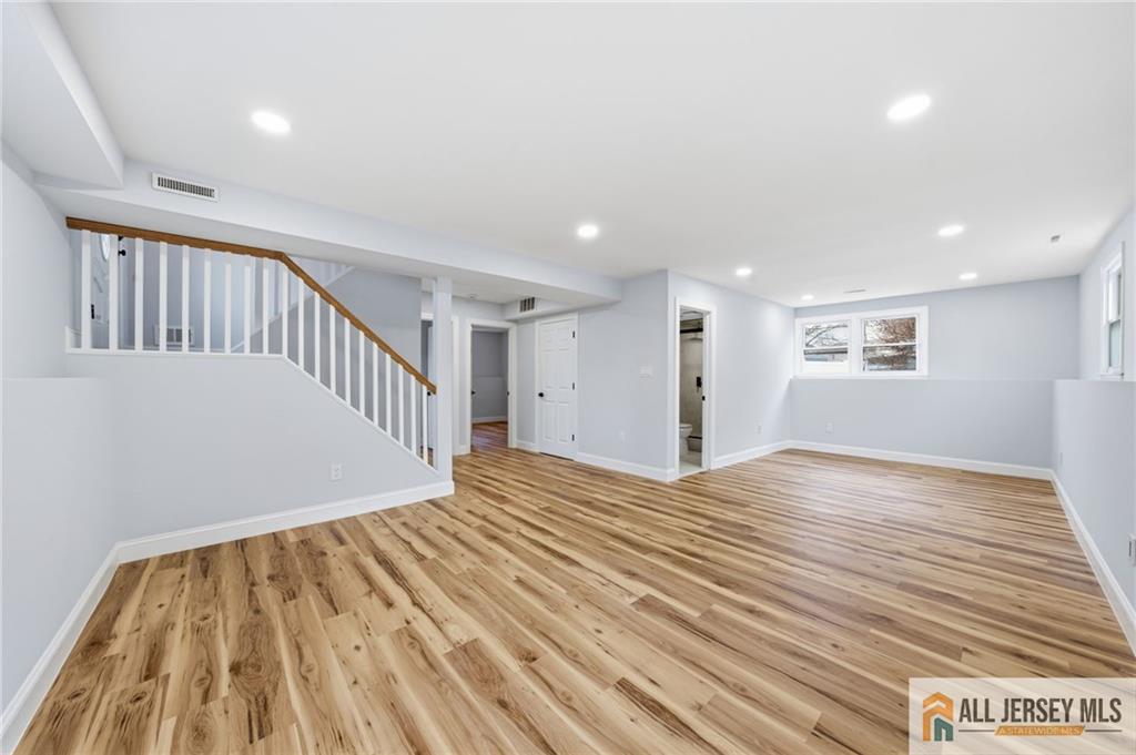6 Wilton Avenue Middlesex, NJ 08846 - Photo 28 of 50 a view of an empty room with wooden floor