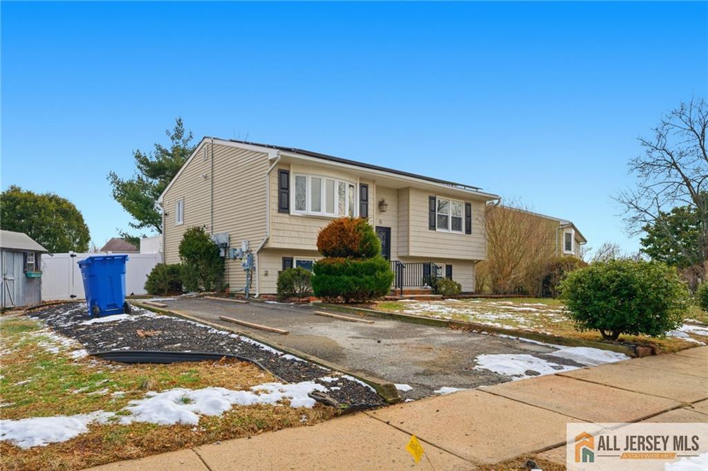 6 Wilton Avenue Middlesex, NJ 08846 - Photo 3 of 50 a front view of a house with yard