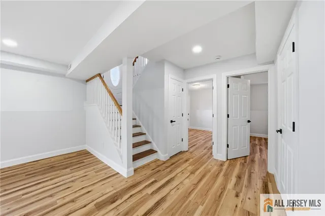a view of entryway with wooden floor