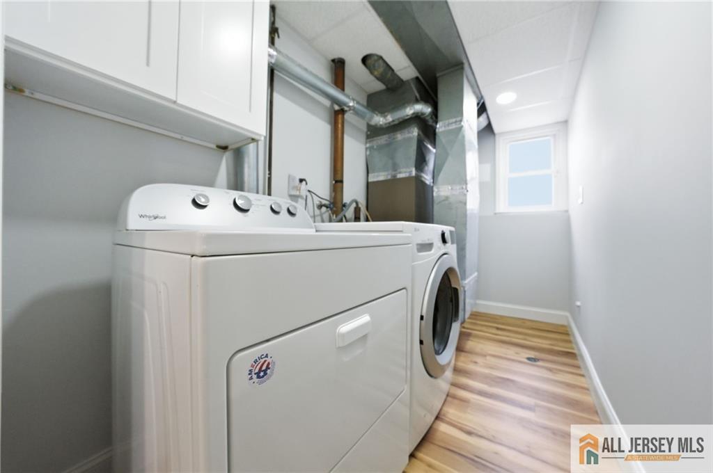 6 Wilton Avenue Middlesex, NJ 08846 - Photo 33 of 50 a utility room with dryer and washer