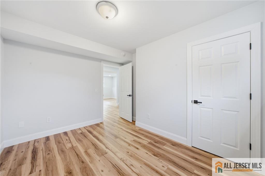 6 Wilton Avenue Middlesex, NJ 08846 - Photo 35 of 50 a view of a room with wooden floor