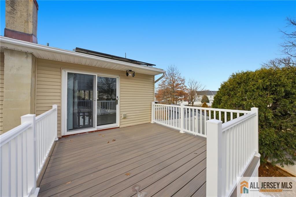 6 Wilton Avenue Middlesex, NJ 08846 - Photo 46 of 50 a view of a house with wooden deck