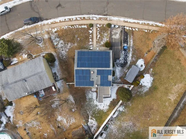 a picture of a table and chairs in the patio