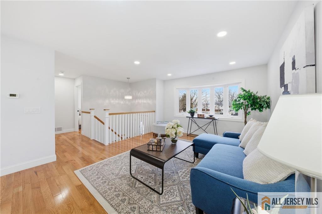 6 Wilton Avenue Middlesex, NJ 08846 - Photo 10 of 50 a living room with furniture rug and wooden floor